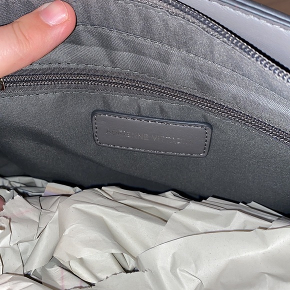 Purse with bow design on front. Brand new with tag. Gray purse. - Picture 14 of 16